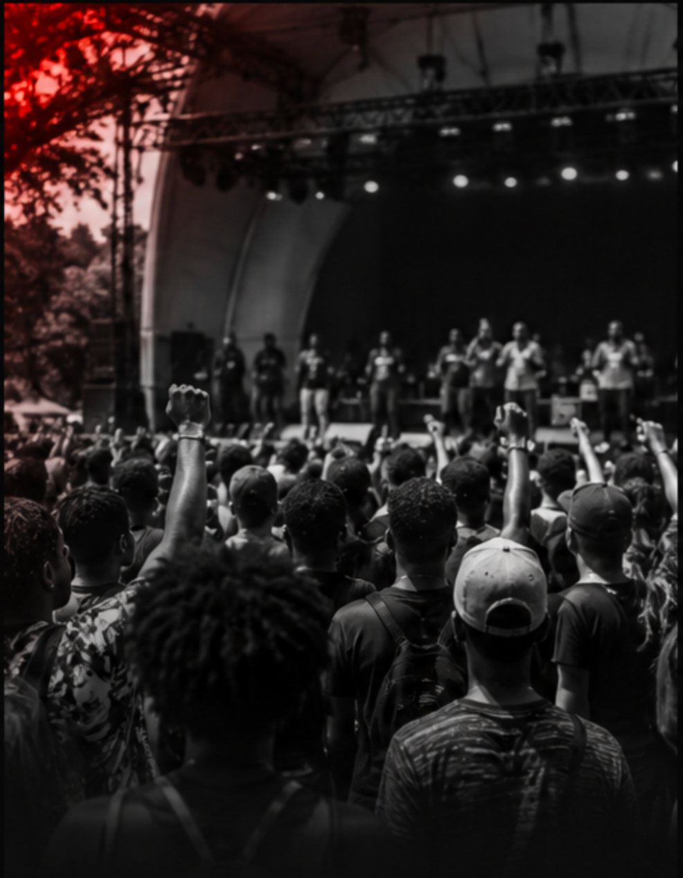 A crowd gathered in front of a concert stage